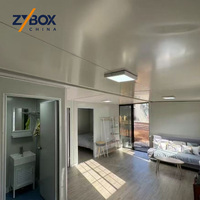 ZYBOX Conteneur extensible en forme de L de 30 pieds et 40 pieds, maison extensible, cabane modulaire préfabriquée en grain de teck, retraite de glamping en plein air