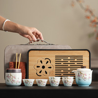 Service à thé Kung Fu chinois, nouveau style chinois, en céramique sous glaçure, motif fleur de glycine, sac en cuir, pour voyage en extérieur, vente en gros