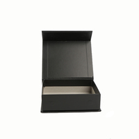 Caja de regalo plegable de cartón rígido con forma de libro negro de lujo Caja de regalo magnética de papel de impresión personalizada