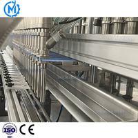 Machine de remplissage d'huile automatique multi-têtes pour bouteilles en plastique (huile d'arachide, d'olive, de tournesol)