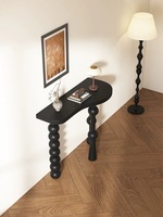 Table console noire moderne et courbée, table d'entrée étroite avec pieds en forme de bulle pour la décoration du salon à la maison