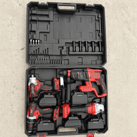 Ensemble d'outils électriques au lithium sans balais quatre pièces du fabricant : perceuse à percussion au lithium, meuleuse d'angle, perceuse électrique, jeu de clés