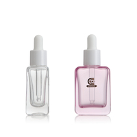 Botol tetes minyak Serum kaca transparan Pink persegi kosong 30ml dengan penetes putih untuk kemasan perawatan kulit