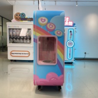 Machine à vendre des barbes à papa neuve, avec bras robotique Datang, capacité de 10 à 18 litres, garantie d'un an, alimentation par prise secteur, service en ligne 24h/24 et 7j/7