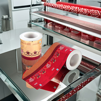 Rollo de película de doble giro de PET metalizado de PVC de alta calidad para embalaje de dulces y chocolate para alimentos de caramelo y confitería