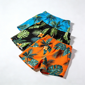 Costume da Bagno da Uomo con Stampa Tropicale Personalizzata OEM, Produttore di Pantaloncini da Surf con Motivi Floreali e Palme - Product Image 1