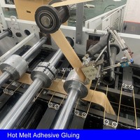 Machine automatique 350TG pour la fabrication de sacs en papier à fond plat avec poignées en corde, idéale pour boulangeries, cadeaux, snacks, sacs de transport écologiques et sacs de courses.