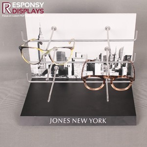 Exhibidor <span class=keywords><strong>de</strong></span> Gafas Moderno <span class=keywords><strong>de</strong></span> Acrílico con Panel Publicitario y Ganchos Colgantes para Seis Pares <span class=keywords><strong>de</strong></span> Gafas en Mostrador - Product Image 2