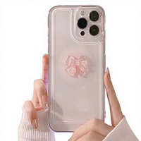 Étui de protection transparent de luxe avec design nœud papillon en cristal 3D pour 16 Pro 15 Pro 13 Mini 12