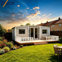 Maison conteneur extensible de 20 pieds, gris clair, avec terrasse blanche, préfabriquée modulaire, unité d'habitation autonome pour jardin arrière de maison au Royaume-Uni