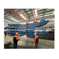 Nouvel échafaudage de plate-forme de condition pour des hôtels Deux ponts d'embarquement hydrauliques d'ascenseur de ciseaux capacité de 10 tonnes