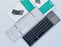 Clavier pliable 64 touches avec pavé tactile intégré, pas besoin de souris supplémentaire pour smartphone, tablette, PC