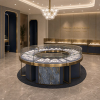 Maßgefertigte Runde Schmuck-Ausstellungsvitrine mit LED-Beleuchtung Polierte Oberfläche Insel-Vitrine für Schmuckgeschäfte Großhandel Einrichtung