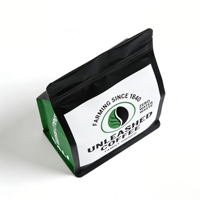 Pochette à fond plat noir mat et vert pour emballage de café, refermable avec fermeture éclair et encoche de déchirement, sac à café spécialisé imprimé sur mesure