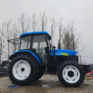 HOLLAND SNH704 4WD traktor bekas dengan kabin dan A/C