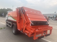 Camion Compacteur de Déchets d'Occasion Euro 3 Dongfeng 4X2 avec Boîte de Vitesses Manuelle, Moteur Diesel, Télécommande, Bac à Déchets 10-12m, Exportation
