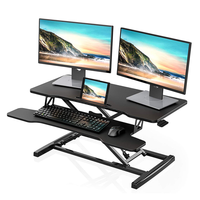 Convertisseur de bureau réglable pneumatique à double niveau noir ergonomique pour poste de travail assis-debout et ordinateur portable