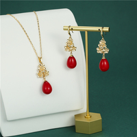 Nouvel ensemble de colliers pendentifs en perles en gros, bijoux en alliage plaqué or 14 carats de Chine, pour cadeaux de fiançailles et fêtes, style hawaïen