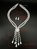 Collier de perles goutte d'eau, luxe léger, style palais rétro de niche, robe de mariée, collier à pampilles exagérées