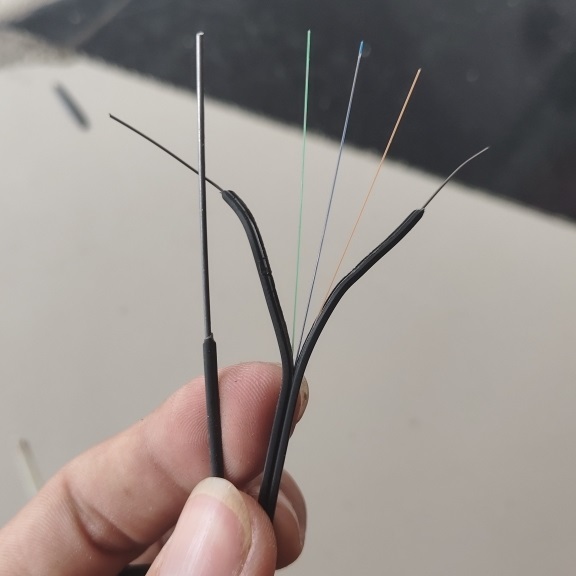 Factory Price Outdoor Flat 3 Steel Wire Optical Cable 1 2 Core 4 Hilos G657A1 A2 Single Mode Aerial FTTH Fiber Optic Drop Cable