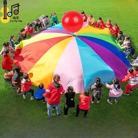 Kinder spielen Fallschirm für Teamwork GameTeam Building Aktivität Spiel Fallschirm Regenbogen spielen Fallschirm