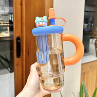 Bouteille d'eau de voyage transparente réutilisable grande capacité 900 ml avec poignée, couvercle et paille pour jus et boissons