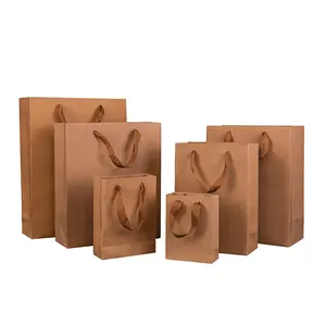 Toptan özelleştirilmiş kahverengi kağıt alışveriş çantası yüksek kaliteli geri dönüşümlü malzemeler kaliteli ve ucuz