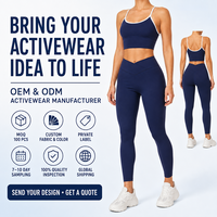 Ensemble de yoga 2 pièces uni personnalisé pour femme avec brassière de sport à bordure contrastante et leggings à taille croisée en V, idéal pour le yoga, le Pilates et l'entraînement en salle de sport
