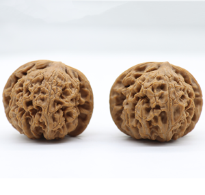 Artisanat naturel Wenwan : Noix de Chine ovales au toucher réel, jouets de bureau en bois pour l'exercice de la paume, objets de collection précieux sélectionnés - Product Image 4