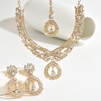 Ensemble de colliers en cristal de luxe européen et américain pour femmes, chaîne de clavicule exagérée, accessoires de robe trois pièces, mariage