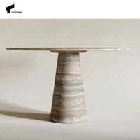 Tostone Table de salle à manger élégante ronde en travertin gris argent-Tables en pierre rondes à pieds coniques pour les salles à manger sophistiquées
