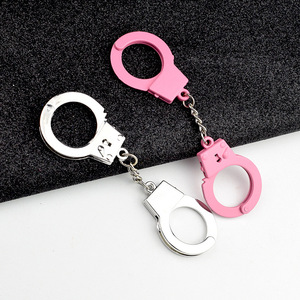 Porte-clés pour clés de voiture avec porte-monnaie, breloque en forme de menottes, porte-clés en métal, porte-clés créatif en forme de menottes, cadeaux de Noël - Product Image 1