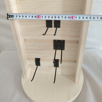 Présentoir rotatif double face en bois pour panneau perforé avec crochets pour l'affichage de marchandises