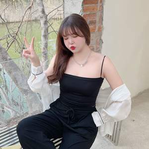 Camiseta sin mangas Runqi N8628 de color sólido y alta elasticidad para mujer, talla grande, para mujeres con curvas, con diseño de clavícula. - Product Image 5