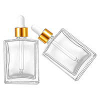 Flacon compte-gouttes en verre transparent de 50 ml (1,7 oz) pour sérum, huile essentielle, soin du visage et du corps, avec compte-gouttes doré