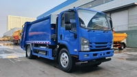 Camion à ordures compacteuses Isuzu 6,5 mètres cubes, camion de nettoyage urbain d'occasion, transport de déchets, usine, 4x4, diesel, boîte de vitesses, pompe