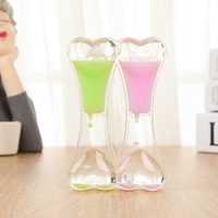 Minuterie de sable d'huile liquide sablier minuterie de liquide sensorielle pour d'autres jouets
