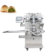 Ligne de production Maamoul sur mesure pour la production arabe de biscuits aux dattes et de pâtisseries aux figues offrant des performances de haute stabilité