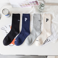Chaussettes de sport en coton pour femmes, couleur unie tendance, printemps et automne, lettres noires et blanches, mi-mollet, style streetwear