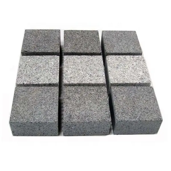 granite stone cubes pattern on mesh cobblestone paving stone Grauer Granit Wuerfel.Pflasterstein