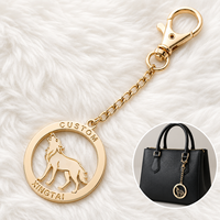 Pendentif de sac de luxe en alliage de zinc doré poli avec motif loup hurlant et logo de marque gravé, porte-clés métallique personnalisé