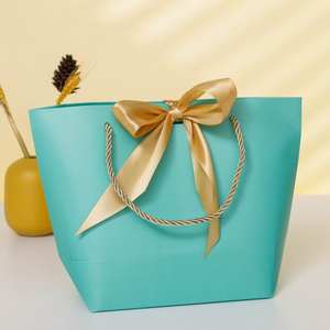 ถุงกระดาษโลโก้พร้อมโบว์สำหรับบรรจุภัณฑ์ของขวัญงานหัตถกรรม - Product Image 4