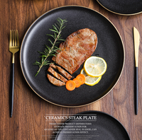 Vaisselle d'hôtel de restaurant occidental de haute qualité Assiette plate de steak givré avec des plats peu profonds en céramique de bord d'or