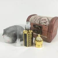 Bouteille en verre unique d'huile d'oud de parfum d'Abarian Fancy Attar avec le rouleau ou le bâton en verre
