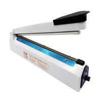Mini scelleuse manuelle pour sachets en Mylar et films rétractables avec corps en plastique et bande chauffante