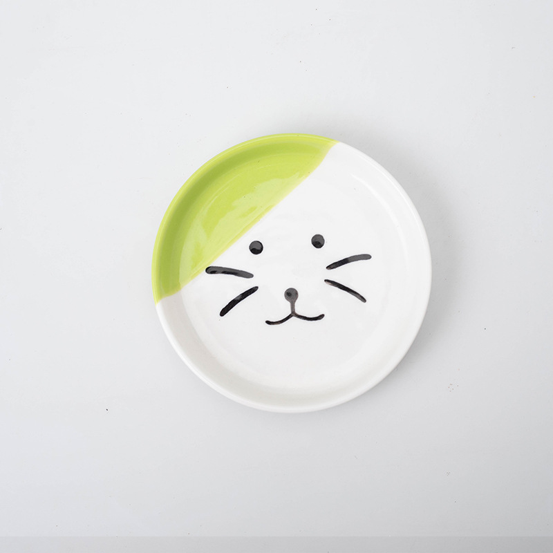 Plato individual con cara de gato verde