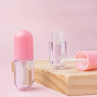 Nouveau Design 2ml Emballage Tube En Plastique Capsule Liquide En Forme De Pilule Unique Brillant À Lèvres Tube Marque Privée Huile À Lèvres Rouge À Lèvres Tube