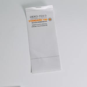 Etiqueta de tela de algodón impresa de alta definición con logotipo y símbolos de lavado para coser para ropa deportiva - Product Image 3