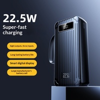 Batterie externe ultra-capacité 30000 mAh avec charge super rapide 22,5 W et chargeur mobile intégré à quatre ports