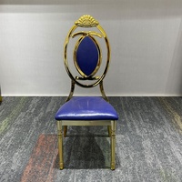 Chaises de banquet élégantes en métal doré avec dossier ovale et revêtement en cuir bleu pour hôtels, mariages, événements et location commerciale
